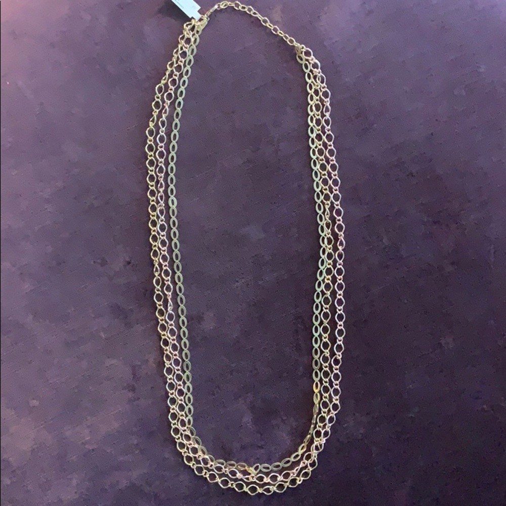 Triple strand yellow and rose gold necklace